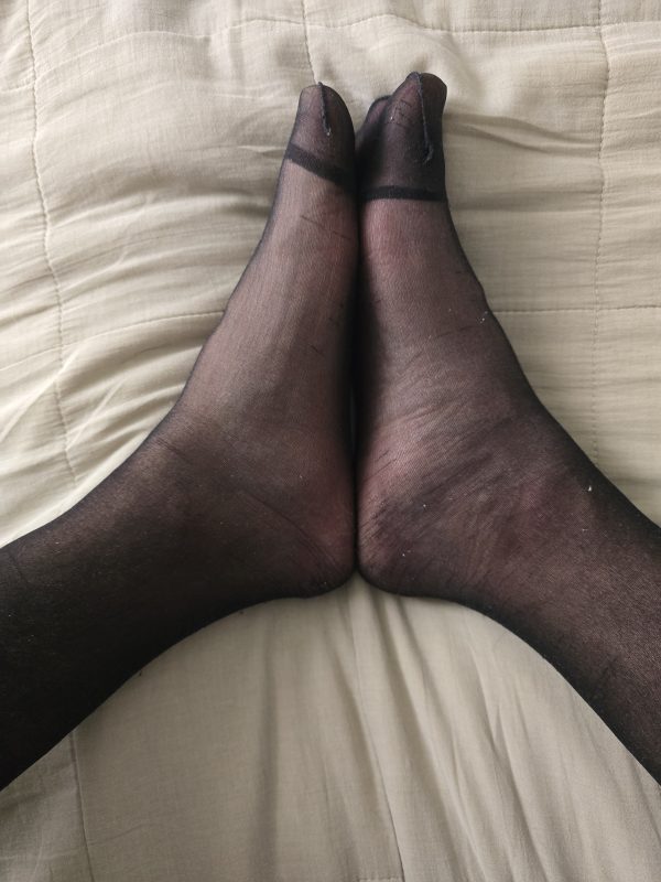 Schwarze Strumpfhose.