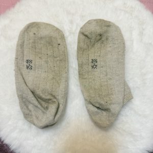 Stinkende getragene Socken