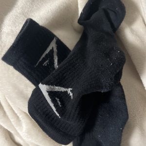 Getragene Sportsocken