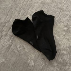 Getragene Sneakersocken