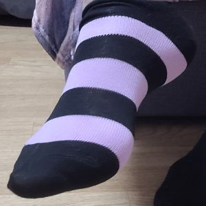 Getragene Socken oder Halterlose