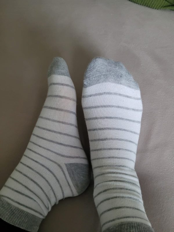 Getragene Ringelsocken