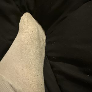 Liebevoll getragene Socken