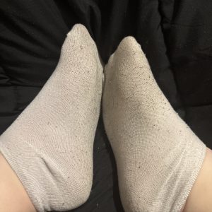 Liebevoll getragene Socken