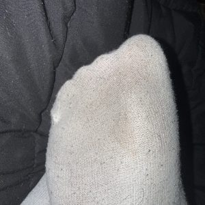 Liebevoll getragene Socken