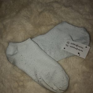 Getragener weiß Socken